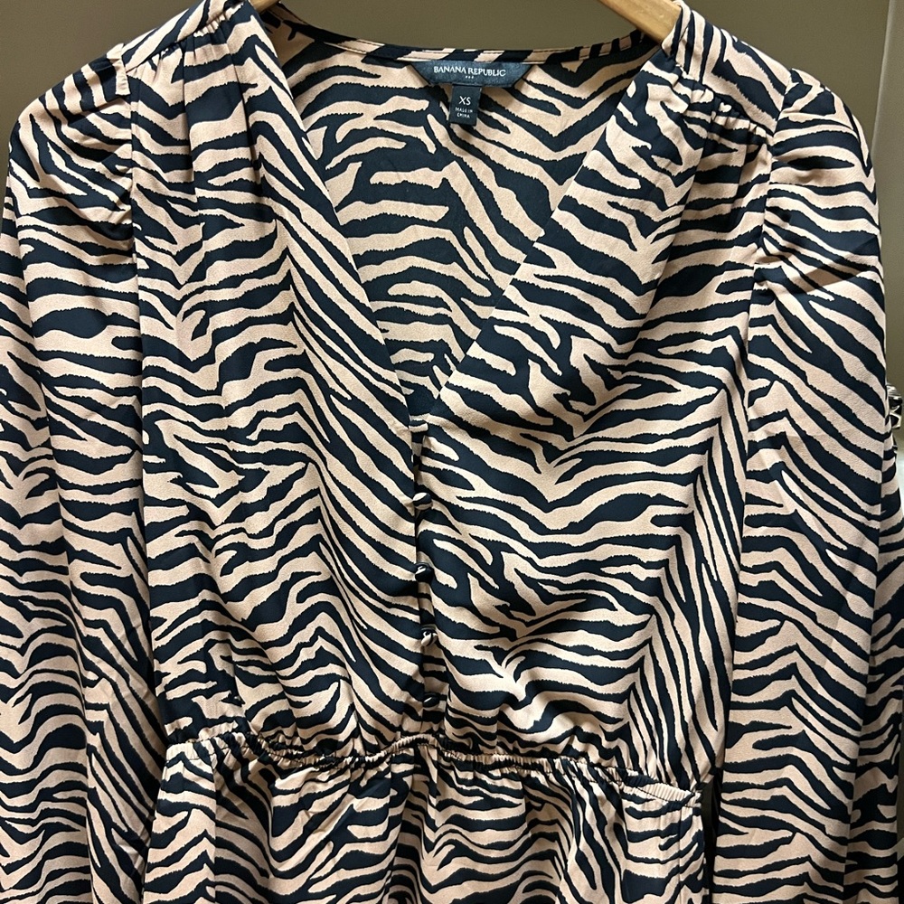 Beautiful zebra print blouse.